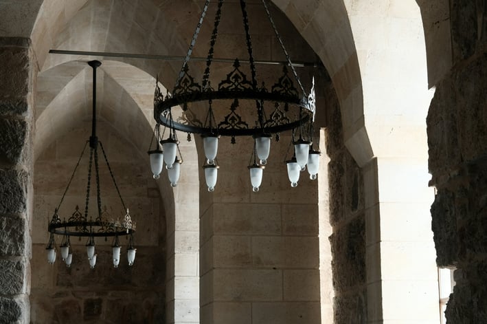 a chandelier hanging from a ceiling
