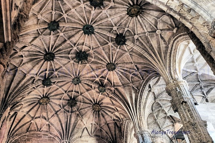 a large cathedral style vaulted ceiling with multiple but simple decorations  