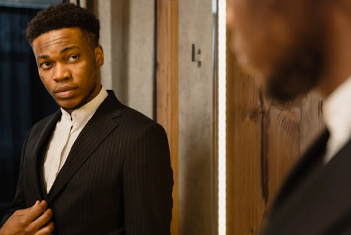 Facial expression in front of the mirror