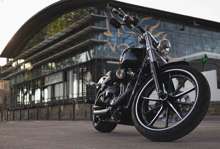a motorcycle parked in front of a building