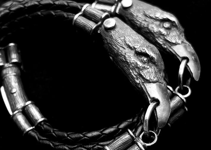 a snake skin leather bracelets with CROW head