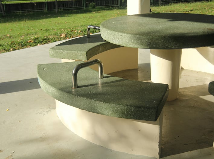 a table with a bench and a bench with a bench and a table with a