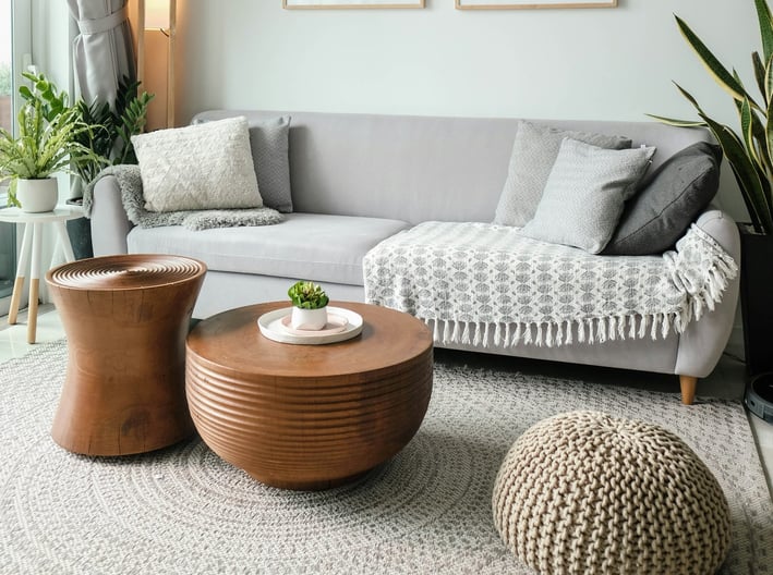 a living room with a couch and a table
