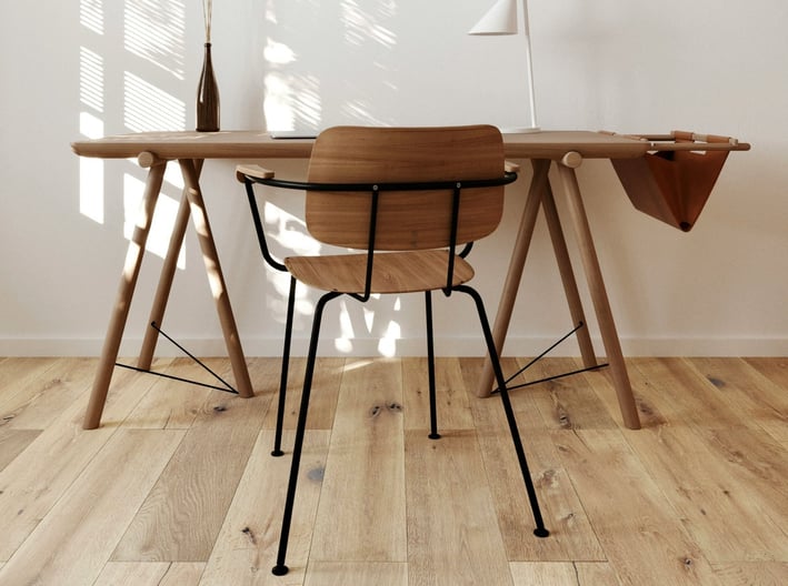 a desk with a wooden desk and a lamp