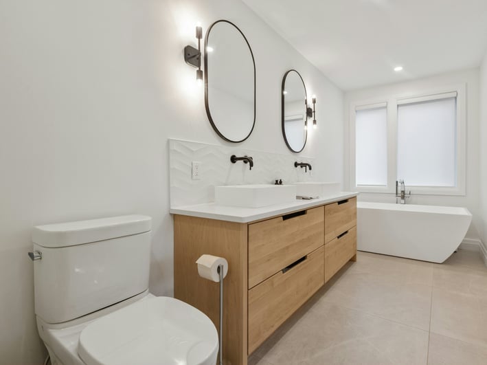a bathroom with a fireplace and a tubtub