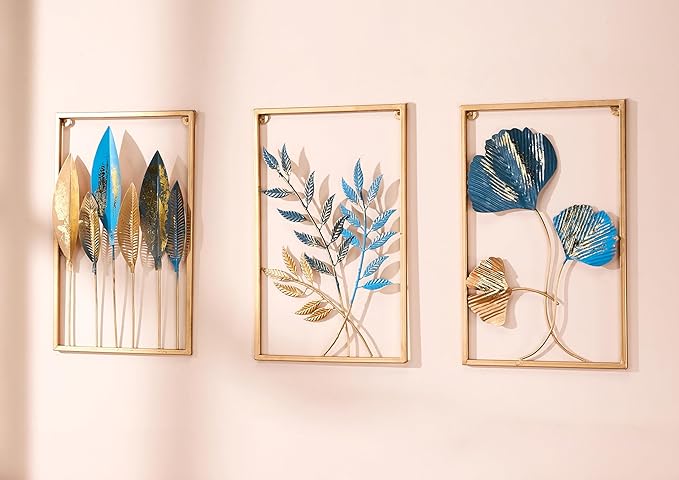 three framed art prints of leaves and flowers