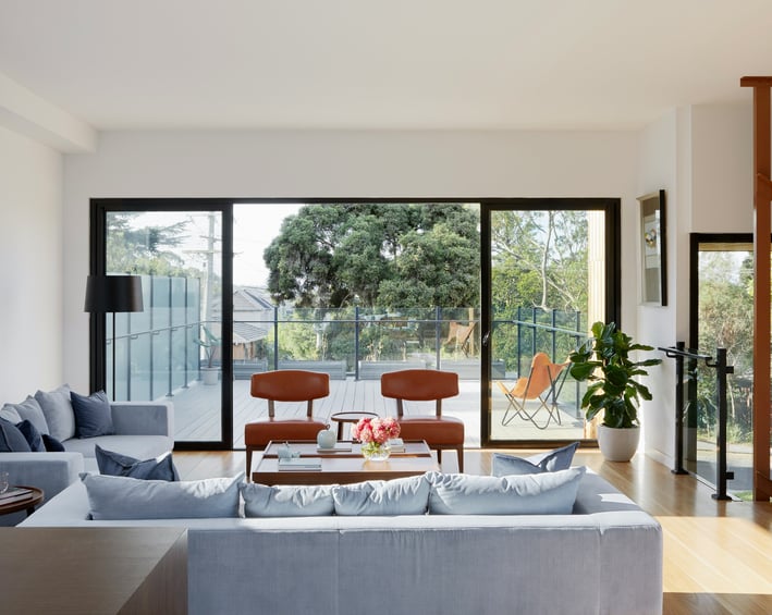 a living room with a couch and a table