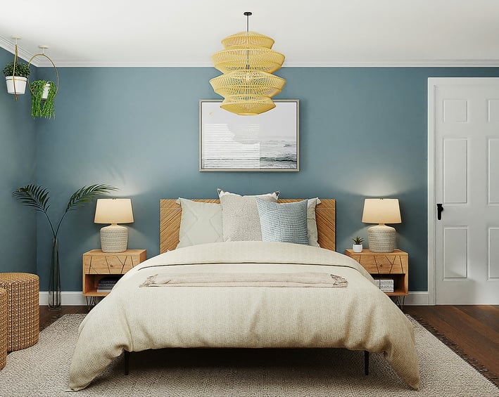 a bedroom with a bed and a lamp