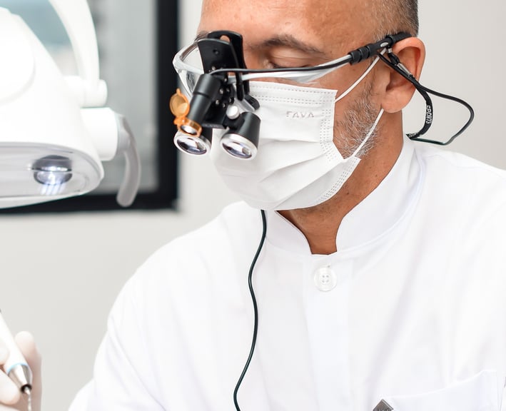 dentist examining a mouth