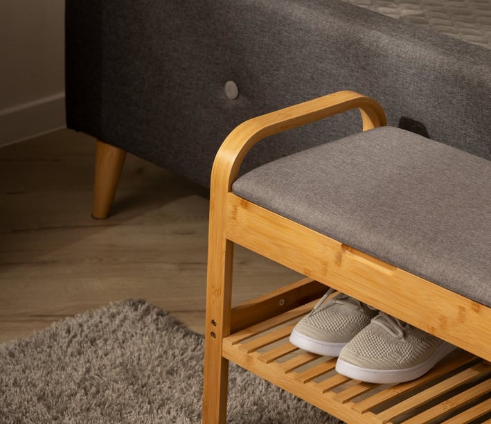 a bench with a bench and a bench with a shoe rack