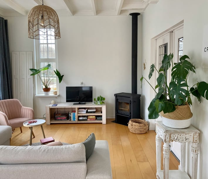 a living room with a couch and a television