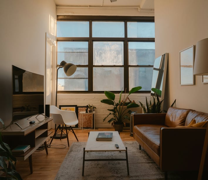 a living room with a couch and a television