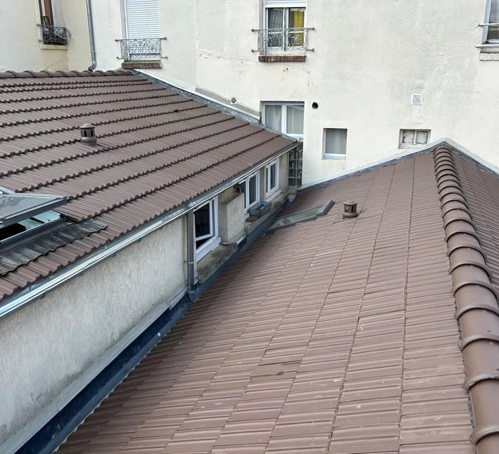 Travaux de couverture réalisés par MF Couverture à Puteaux (92) - Pose de toiture en tuiles et travaux de zinguerie