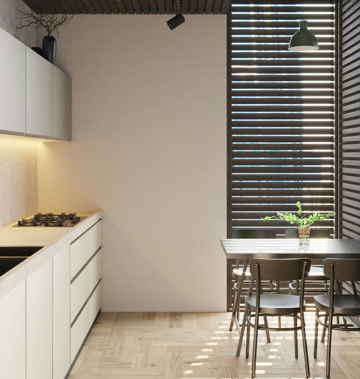 a kitchen with a table and chairs and a table