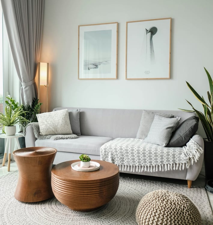 a living room with a couch and a table
