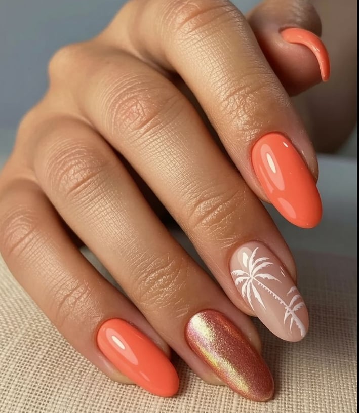 Pink and orange ombre nails with chrome finish