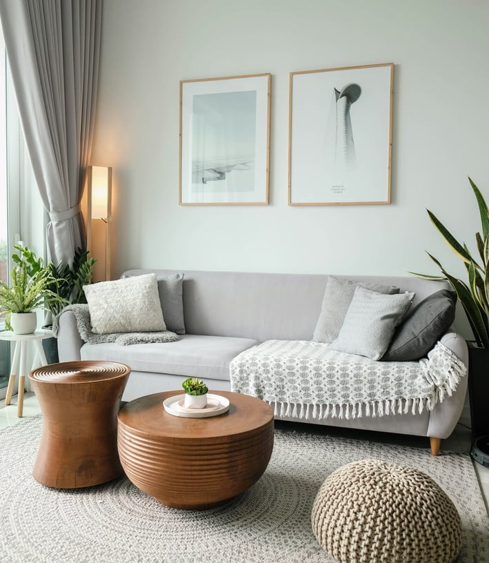 a living room with a couch and a table