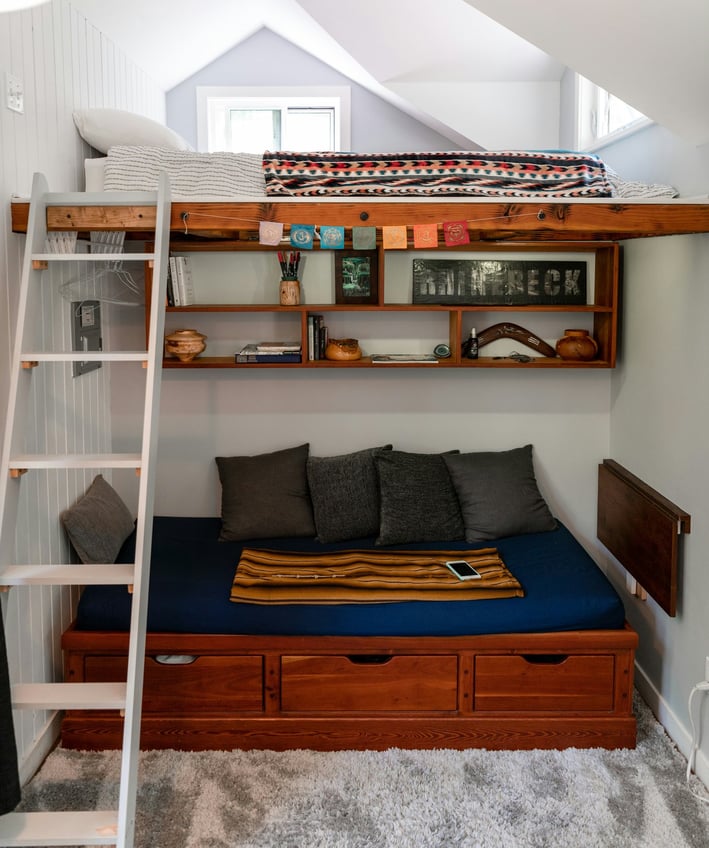 a lofted room with a lofted bed and a lofted bed
