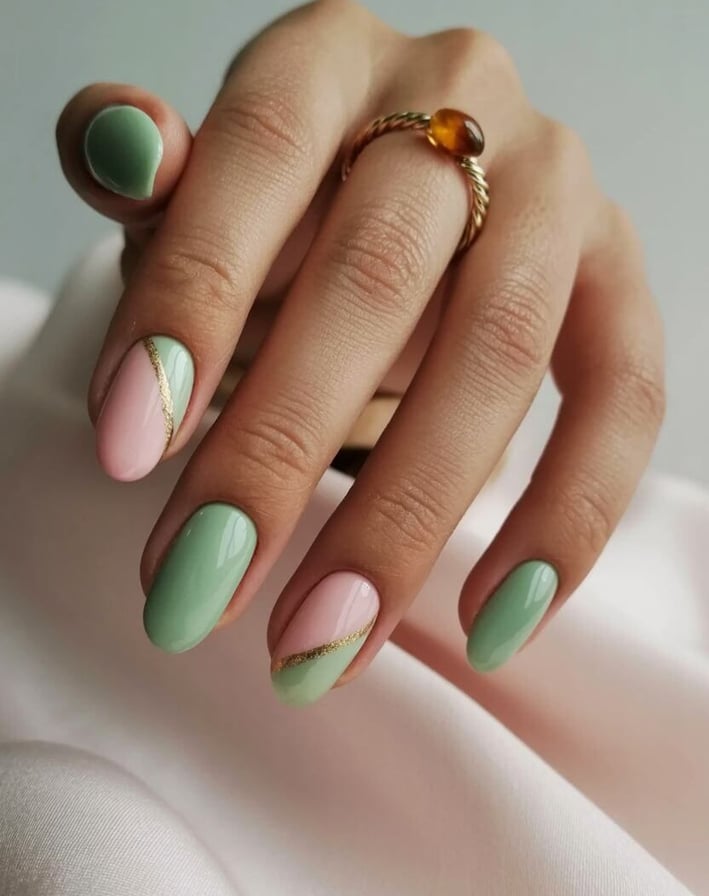 Mint and blush nails with gold stripe detail