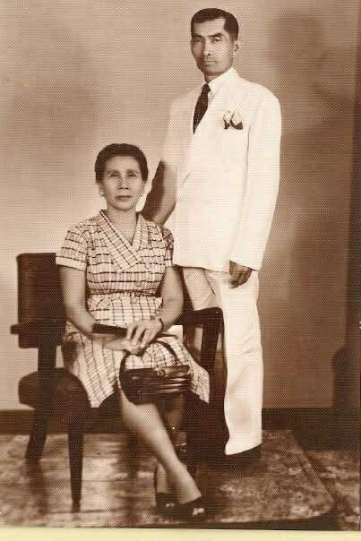 a man and woman posing for a photo