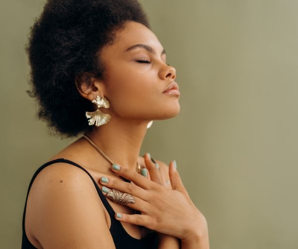 a woman taking a deep breath