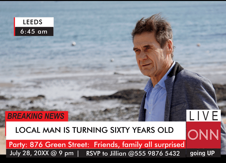 a man in a suit and tie is looking at the camera