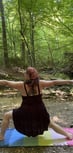 Rachel outdoor and forest with rainbow mat black dress yoga pose