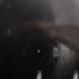 Close up visual - eye sees city landscape in the midst of fog
