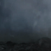 Scene from short film - visual of ocean waves trapped in gloomy clouds