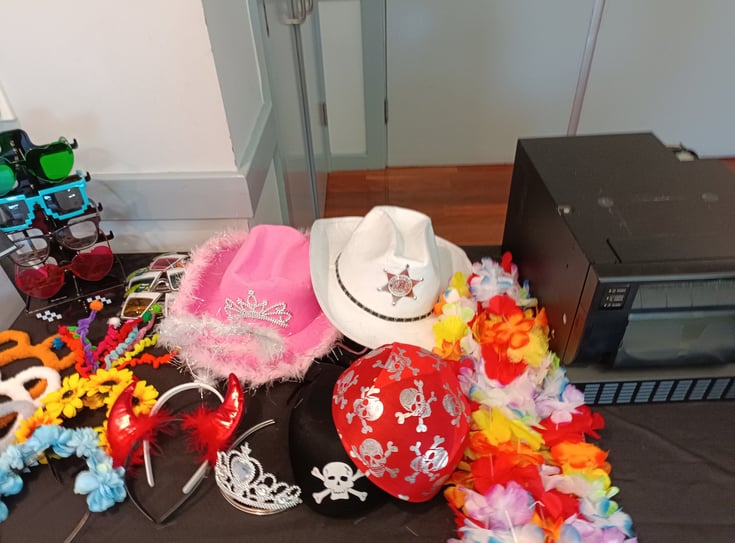 a table with hats and props