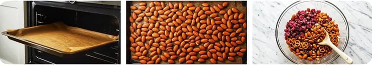 A tray in the oven, roasted almonds on a baking sheet, and a bowl of almonds, cranberries, and pretzels.