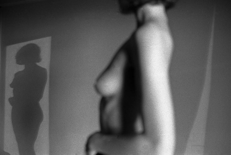naked woman and her shadow