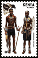 a stamp with a picture of a Kamba couple in native clothing