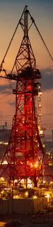 a red tower with a red tower in the background