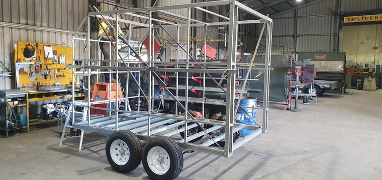 Worker at Trailers 2000 working on the skeleton of the Pimp Your Party trailer.