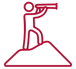 a man standing on a hill with a telescope