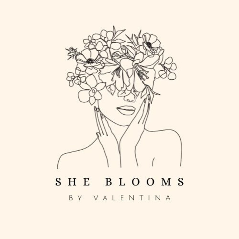 She Blooms logo