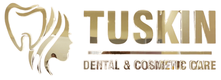 TUSKIN Dental and Cosmetic Care logo