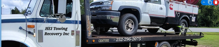 Hei Towing & Recovery Inc logo