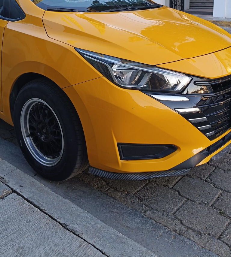 Taxis Oaxaca Yellow logo