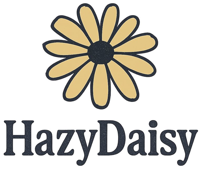 HazyDaisy or Hazy Daisy, whimsical vintage style one-of-a-kind prints on apparel, accessories, mugs, stickers. Otherworldly quirkiness focusing primarily on FlowerCat, Hazels face as the center of a Daisy looking stern and morose. The apparel is built to last. Sourced appropriately, eco-conscious material whenever possible. organic cotton. Prints are designed by owner logo