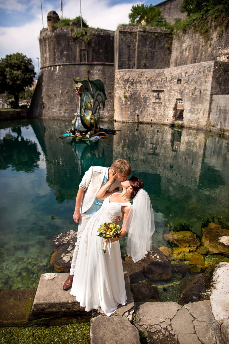 Wedding at Kotor castle fortress - Couple stone walls emerald water Montenegro medieval Boka Bay