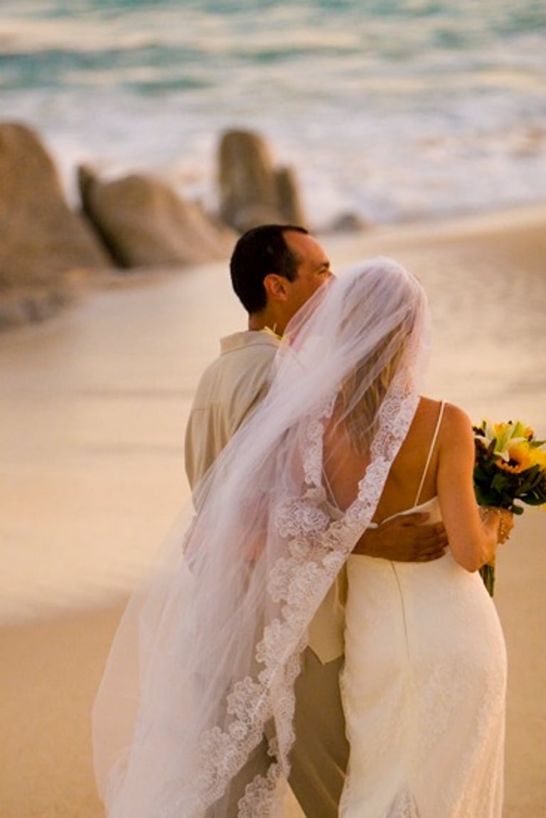 Beach Destination Wedding. Bride and Groom Photo Shoot. Walking on the beach. San Jose del Cabo, Mexico.
