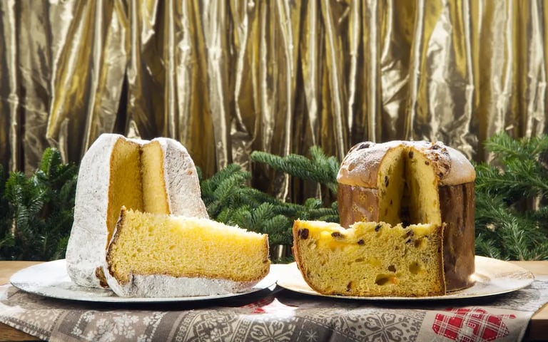 Classic Italian pandoro and panettone cake dusted with powdered sugar, traditionally eaten on New Year’s Eve