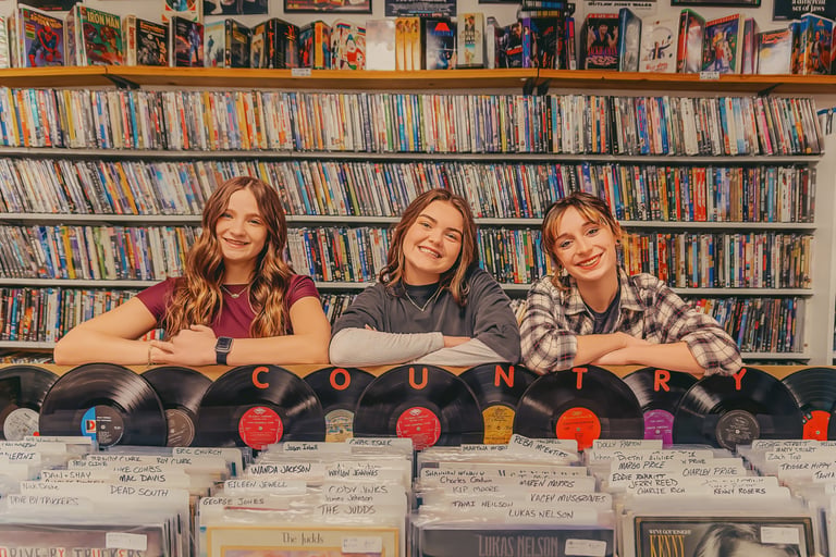 Senior pictures in a record store by Manheim PA senior picture photographer. Senior Rep Team Lancaster PA