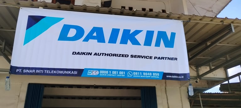 Daikin authorized service partner banner for PT. Sinar Inti Telekomunikasi air conditioning services.