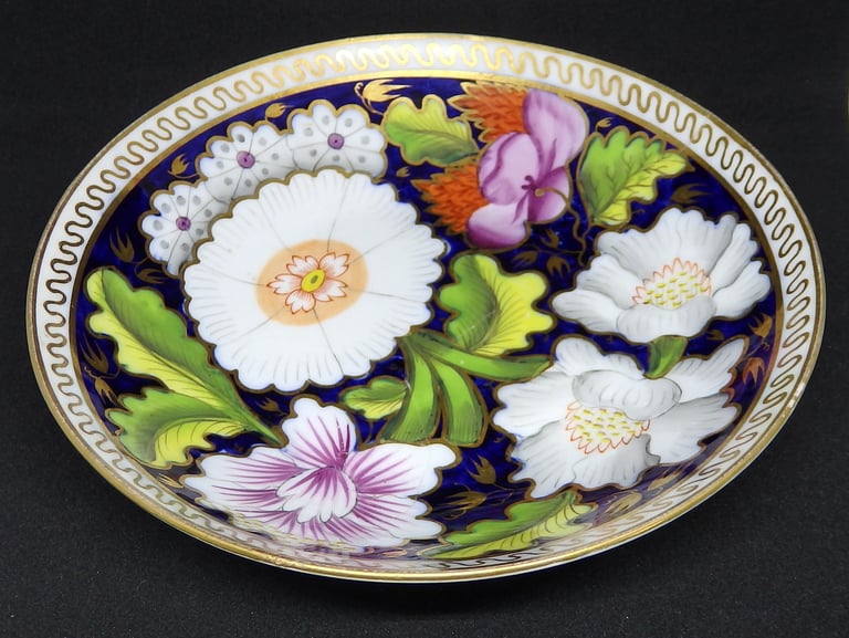 New Hall floral saucer after conservation