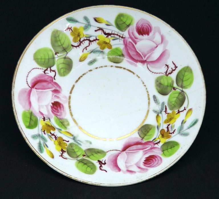 New Hall floral saucer after conservation
