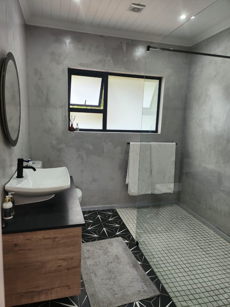 Paint Effect wall in Shower with glass screen and vanity