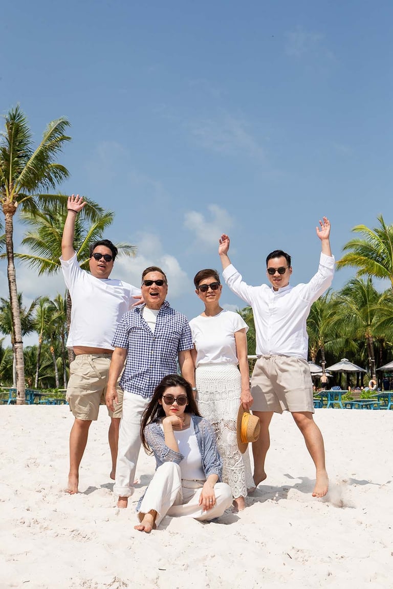 Family beach photoshoot group portrait on Bai Kem beach